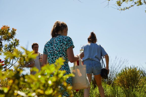 Visitors taking time to slow down in nature while exploring the peaceful landscapes of Elgin Valley
