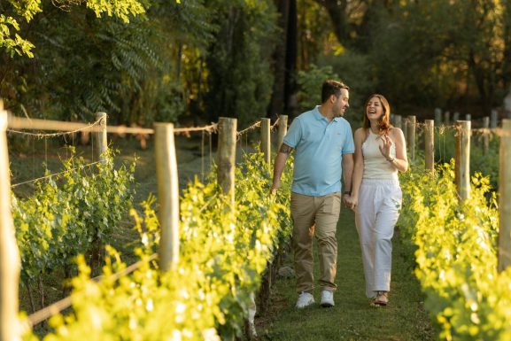 Couple enjoying a budget-friendly day trip while spending R500 in Elgin Valley surrounded by mountain views and local attractions.